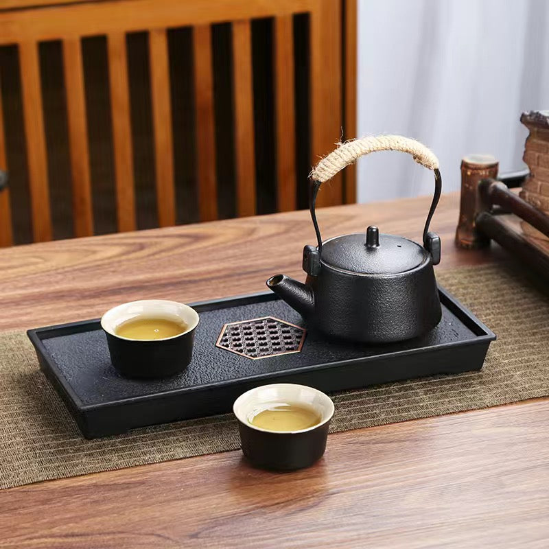 Four Pieces Teapot with Two Cups and A Tea Tray